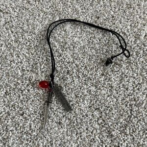 Black Cord Necklace with Red and Silver Charms “All Magic Comes With A Price”